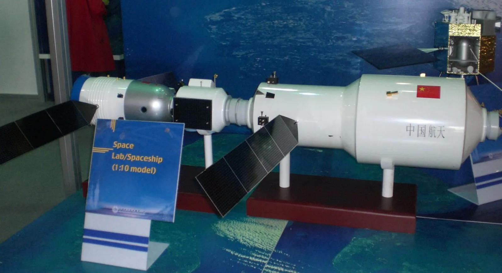 Tiangong-1, launched September 2011 — an 8-tonne test lab, not a station. Its job was to be a target: something for Shenzhou crews to find, chase, and dock with, proving China could do orbital rendezvous before betting on a permanent outpost.