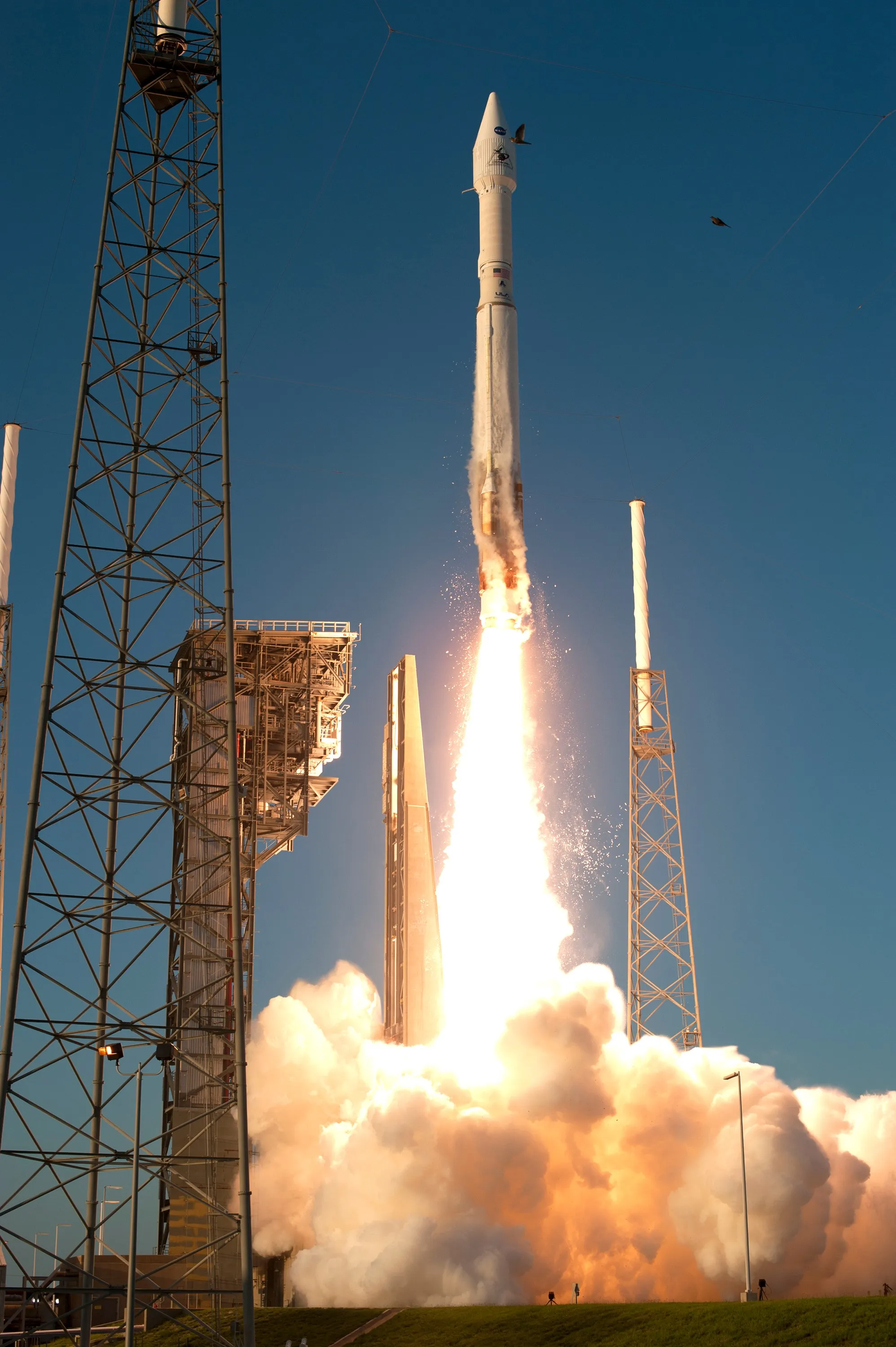OSIRIS-REx reaching down to touch Bennu — and finding not solid ground but a rubble pile so loosely bound that the sampling head sank straight in, nearly swallowing the arm. “Mining” a body like this is unlike anything ever done on Earth.