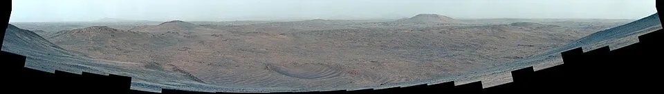 Perseverance lands itself. Mars is light-minutes away, so by the time Earth hears the craft has hit the atmosphere it is already down, one way or the other — the rover reads the terrain rushing up and chooses its own safe spot.