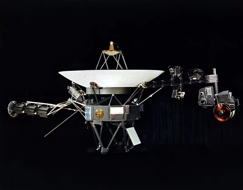 Voyager 1, more than twenty-four billion kilometres out, still answers — but a question sent today waits some forty-five hours for its reply. You do not converse with it so much as leave a letter and come back for the answer.